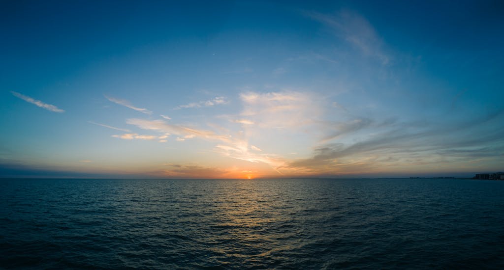 Photo of Body of Water during Golden Hour